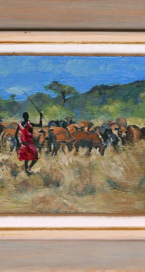 Masai Herder with cattle by Isabel Hutchison