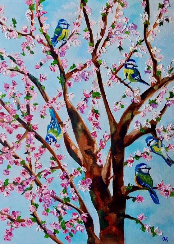 Apple tree with flock of birds