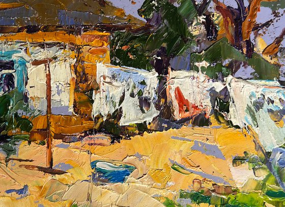 Clothes are drying in the yard