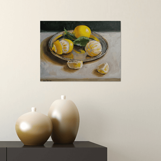 Lemon fruit slices on metal tray still life