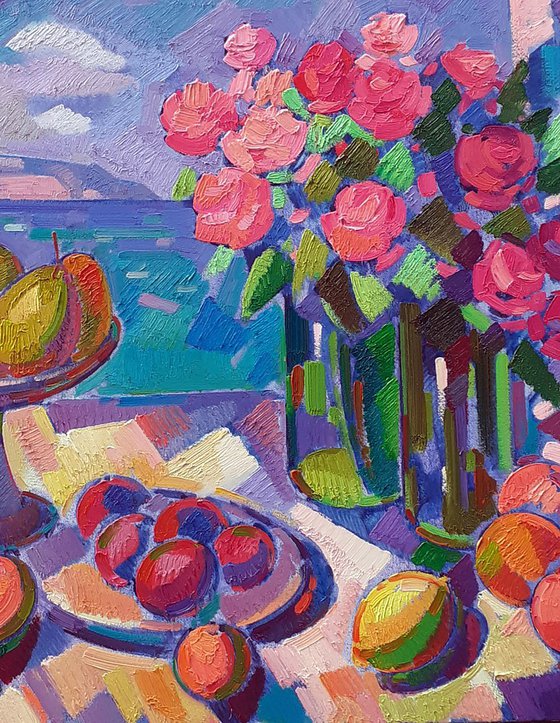 Roses and fruits on the shore
