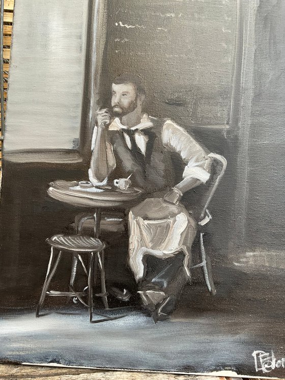 Waiter in cafe on a break