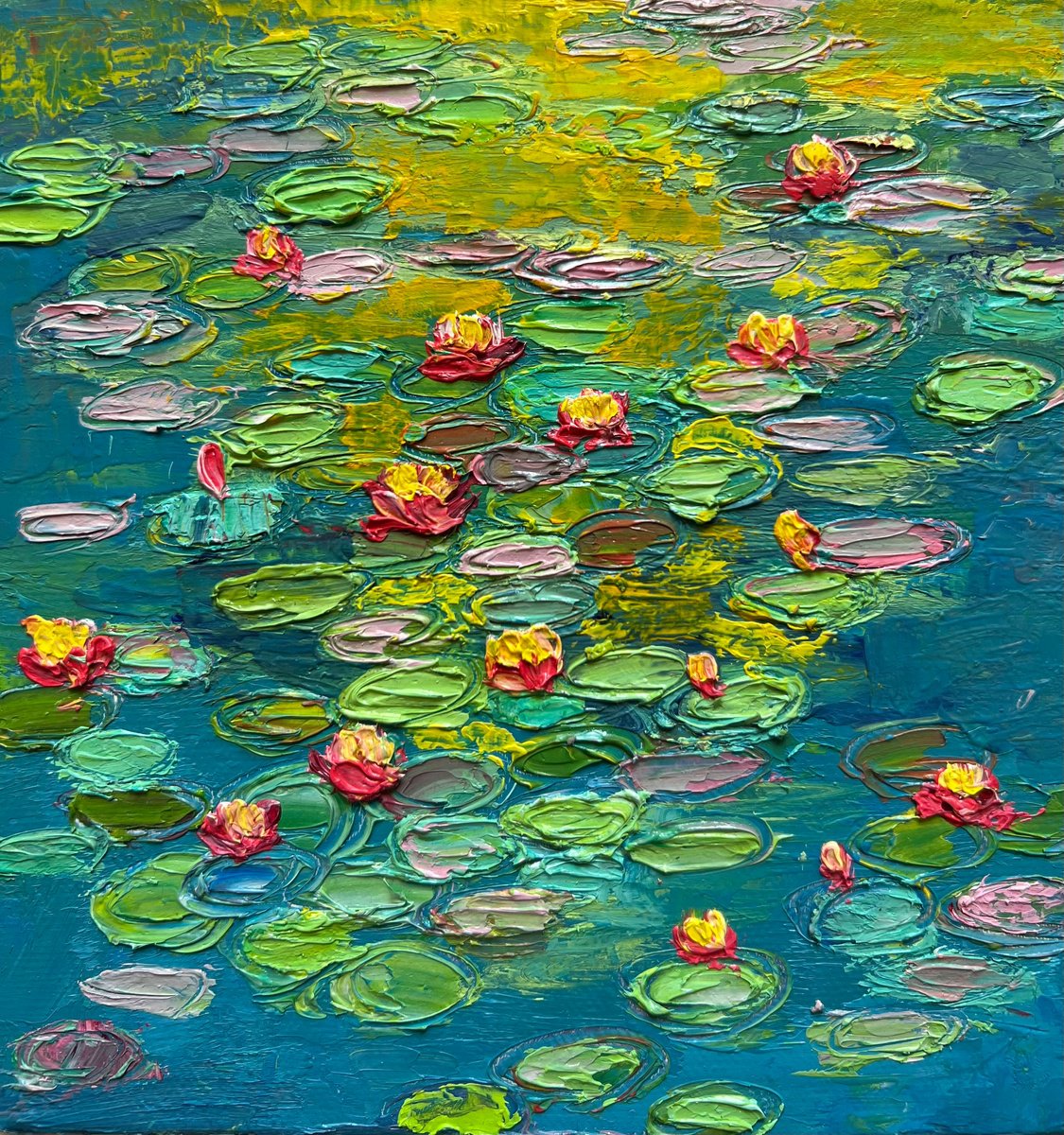 Evening glow on water lilies by Amita Dand