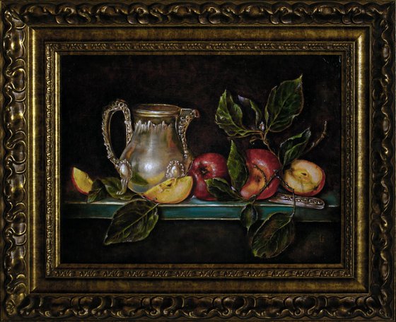 Silver jug with apples