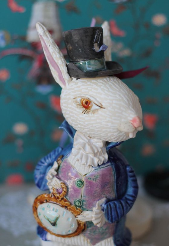 I'm late! I'm late! For a very important date! White Rabbit, hanging sculpture.