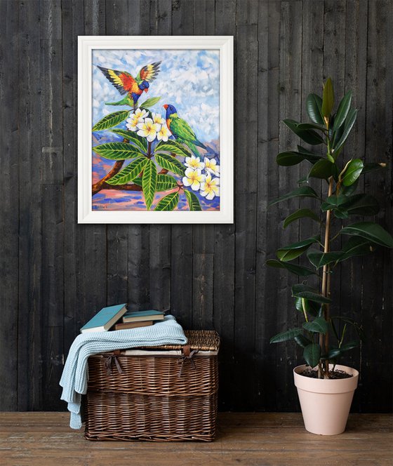 Rainbow lorikeets and Frangipani flowers