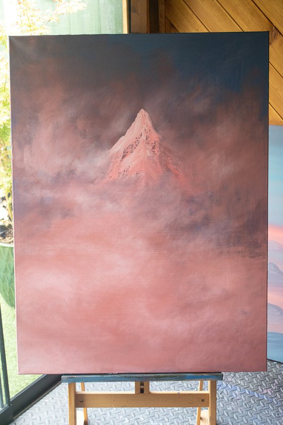 Blush Summit Through the Clouds