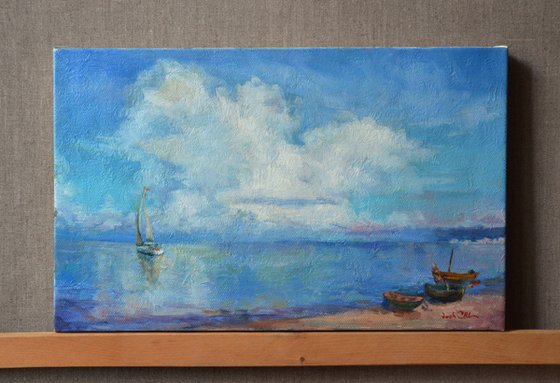 Sea and white clouds