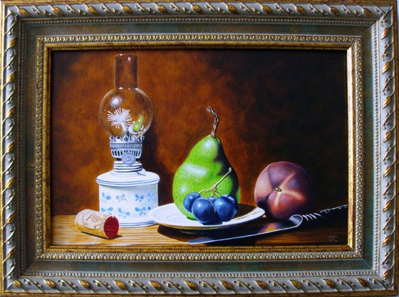 Oil lamp with fruits