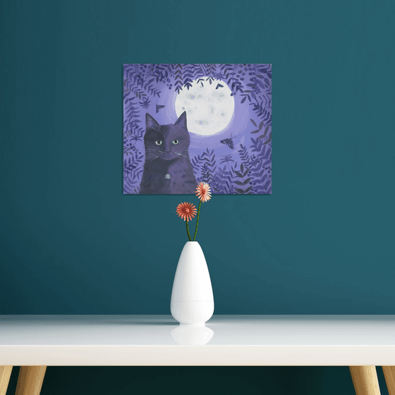 Black cat with the moon