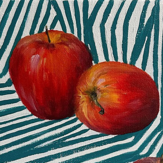 Red apples on green