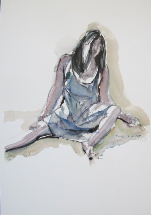 Seated female in a blue dress by Rory O’Neill