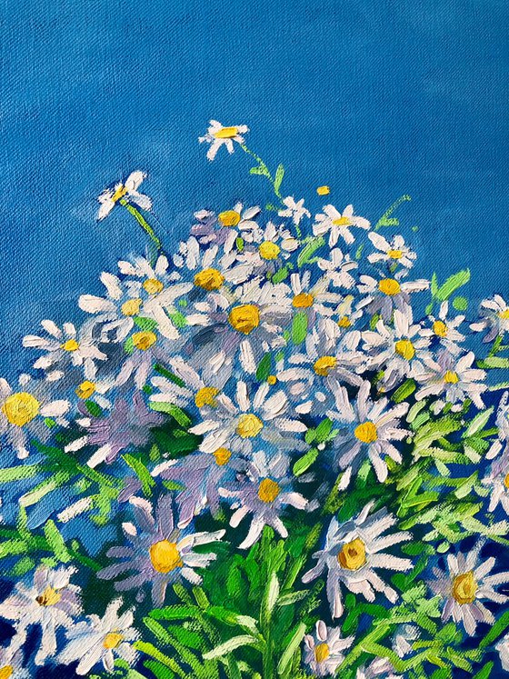 Blue sky with white flowers