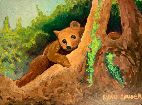Bear Resting On A Tree