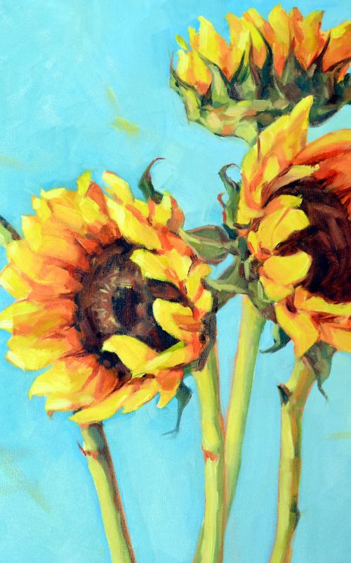 Sunflowers on blue by Irina Ushakova