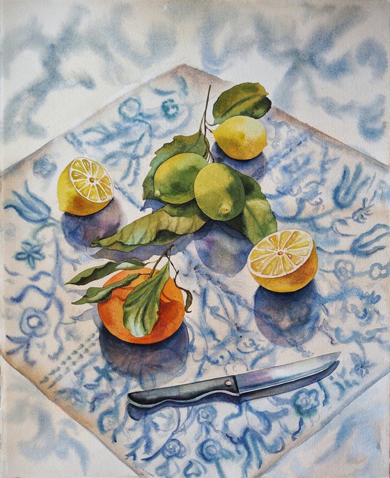Lemons, orange and knife