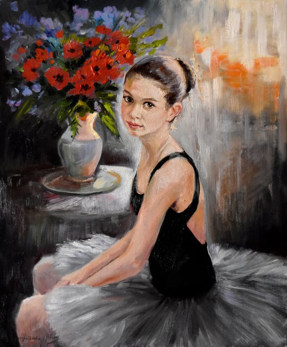 A small ballerina with red poppies