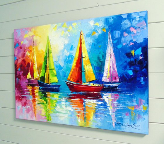 Sailboats in the rainbow dawn