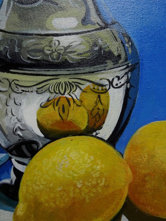 Still life water jug and lemons