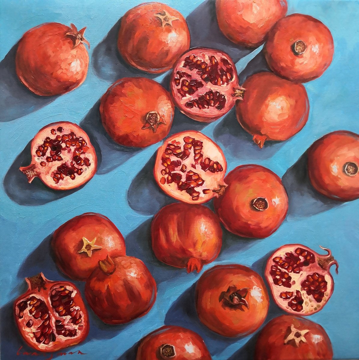 Ripe red pomegranates on turquoise - blue background still life by Jane Lantsman
