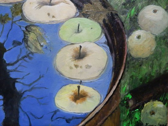 Apples in the water barrel