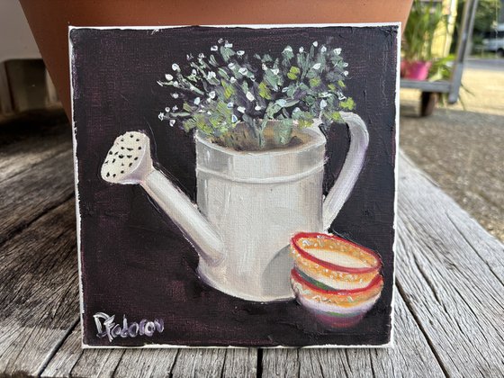Watering can still life