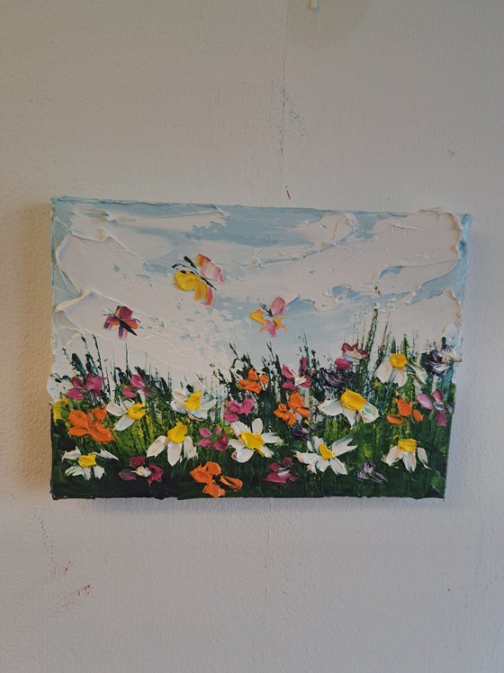 Daisies and butterfly