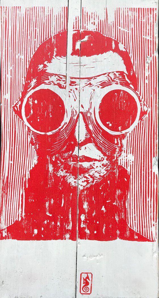 Red Googles on wood block