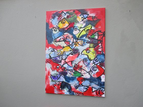 coloured fishes jumping