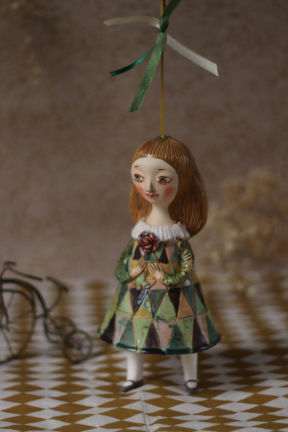 Innocent little girl with a flower. Hanging sculpture, bell doll by Elya Yalonetski