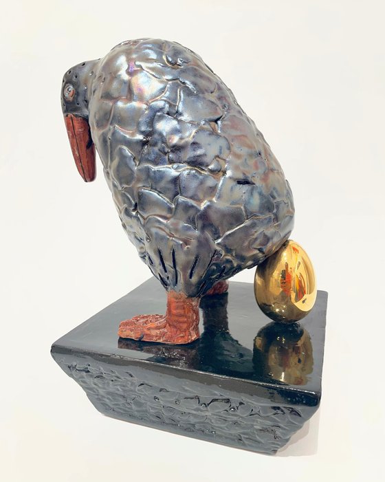 Black Bird with Golden Egg