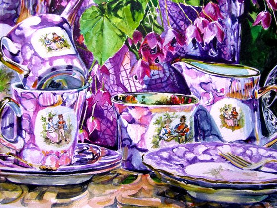 Still life with tea set in the garden