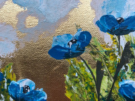 Blue poppies on gold leaf