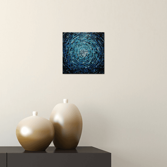 Small shine of iridescent blue glow