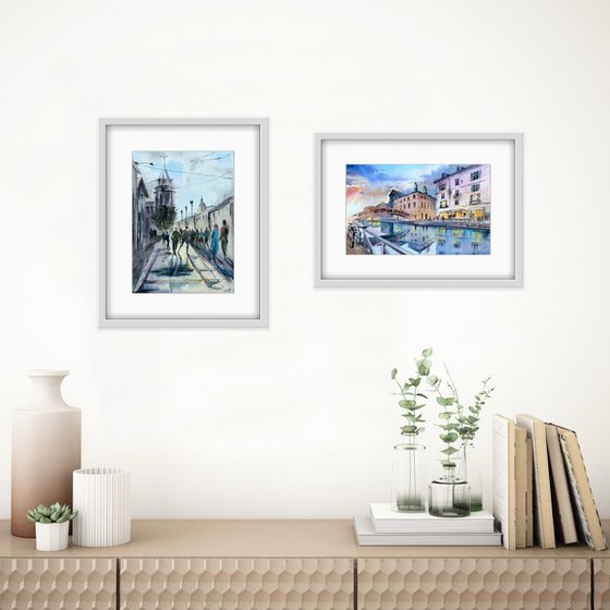 Set of two artworks. City landscape. Sunset and reflection of architecture in the water.