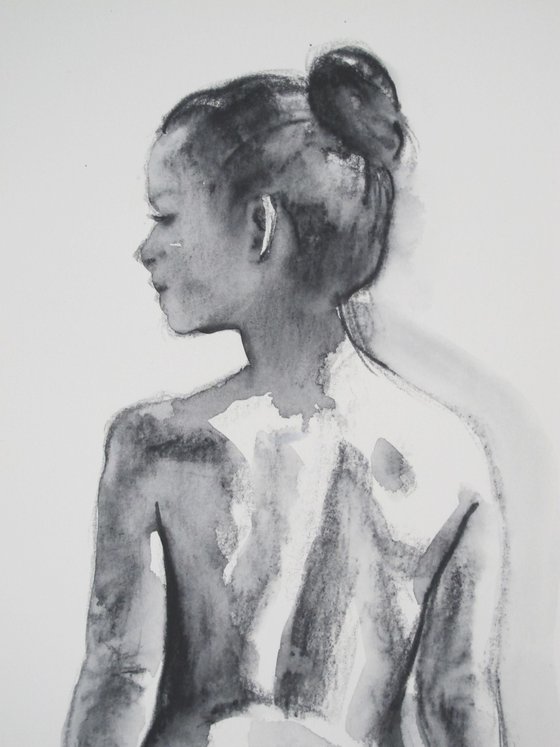 Standing female nude back view