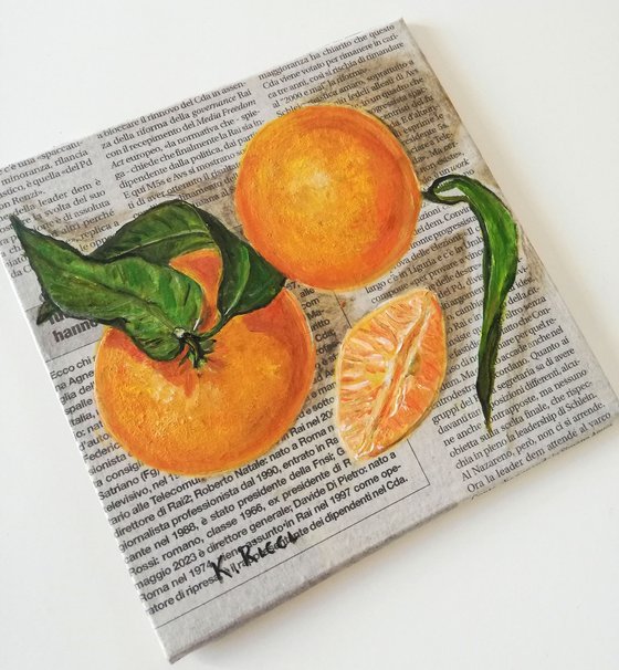 "Tangerines on Newspaper"