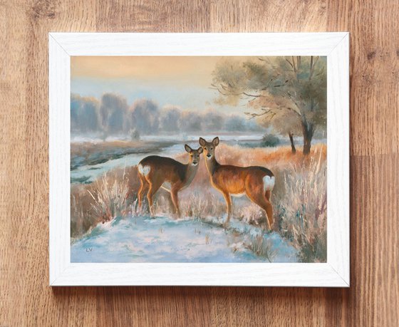 Snowy landscape with deer
