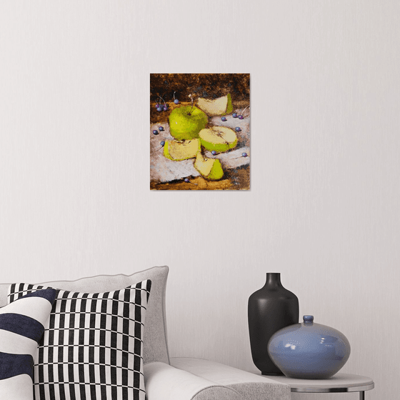 Green apples on dark