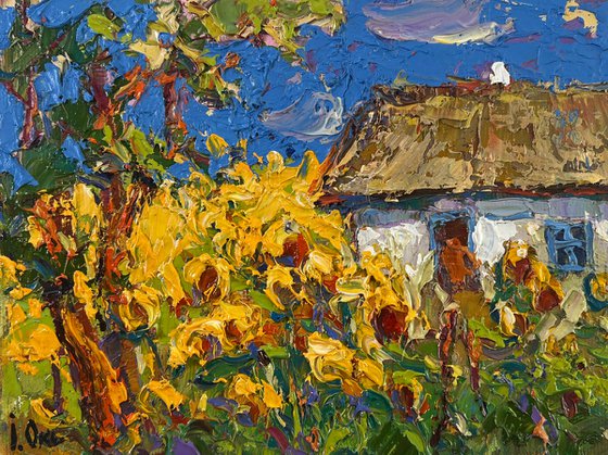 House and Sunflowers