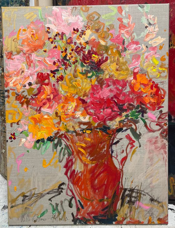 Summer flowers in a red jug