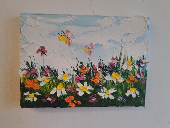 Daisies and butterfly