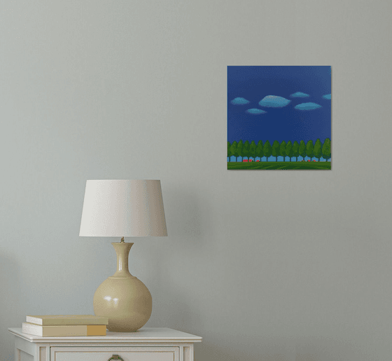 Dike with trees, floating clouds