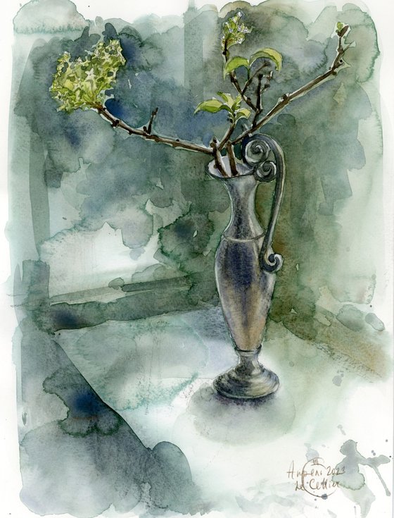 Still life with a sprig of white lilac on the window.