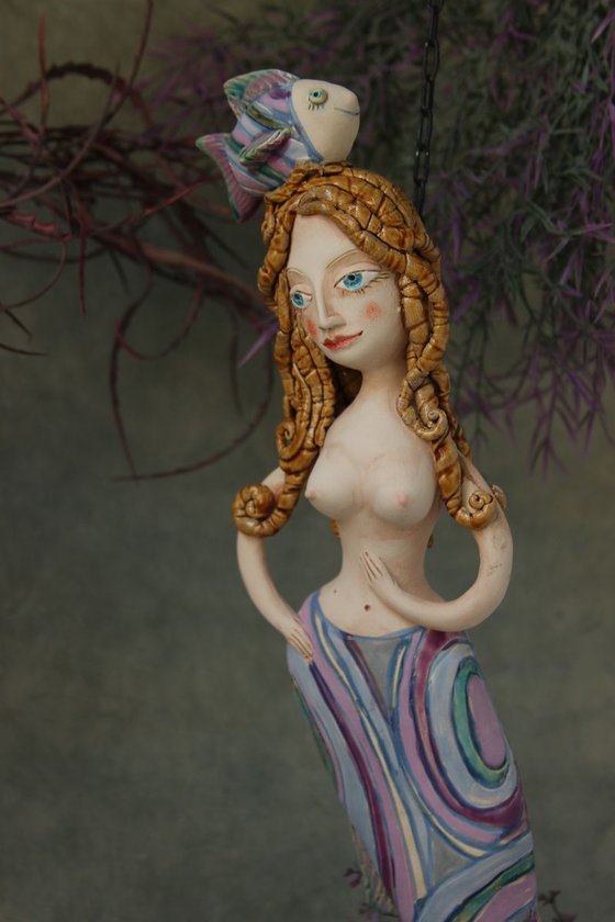 Mermaid with a fish,  Wall sculpture by Elya Yalonetski.