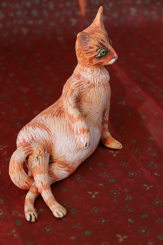 Red Fury Resting. Ceramic cat sculpture.