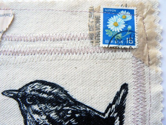 Little Jenny (Wren) textile and lino print stitched collage with buttons fabric and found papers