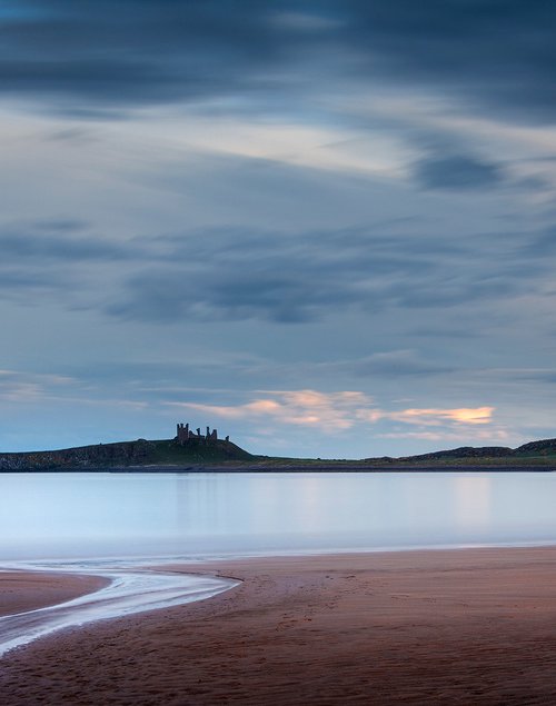 Dunstanburgh Castle from beach by DAVID SLADE