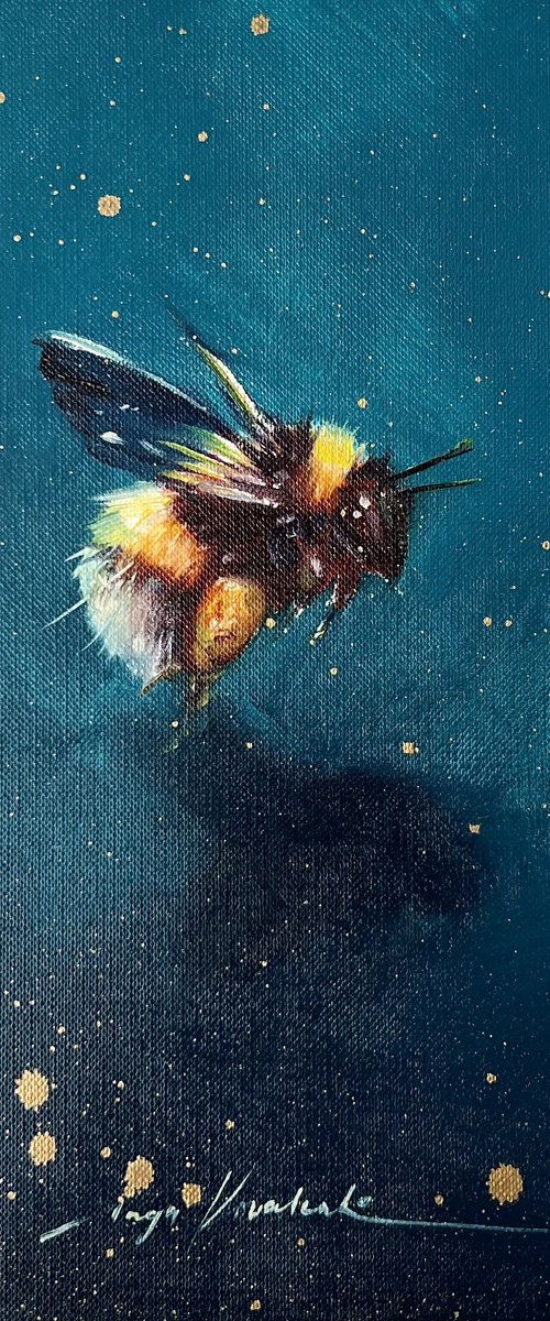 This is a honey bumblebee in flight by Inga Kovalenko