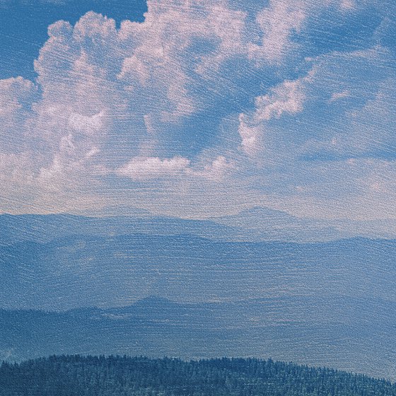 White clouds over horizon.